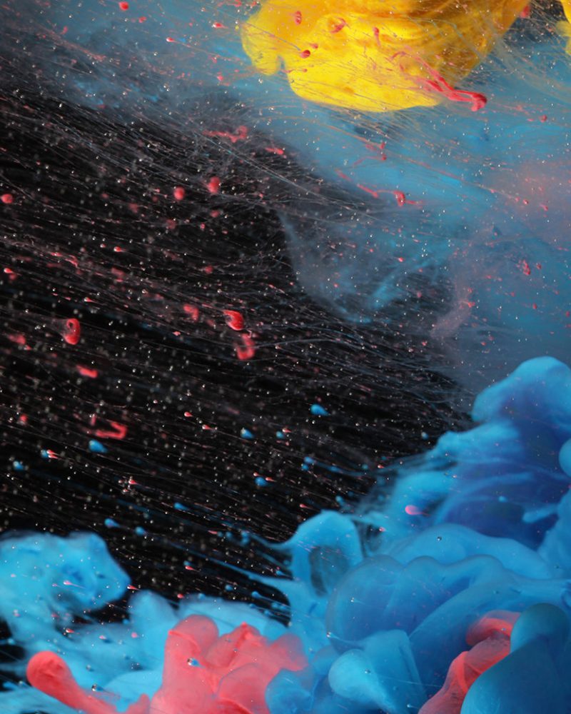 Acrylic colors and ink in black water. Ink blot. Abstract backgr Acrylic colors and ink in black water. Ink blot. Abstract background. Horizontal long banner.